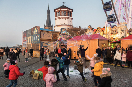 Christmas market on Burgplatz square in Düsseldorf Christmas market on Burgplatz square in Düsseldorf